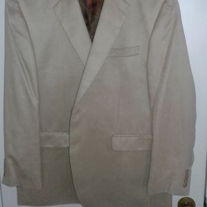 Ralph lauren sportscoat 46 r. 100% polyester.  Light tan barely worn.